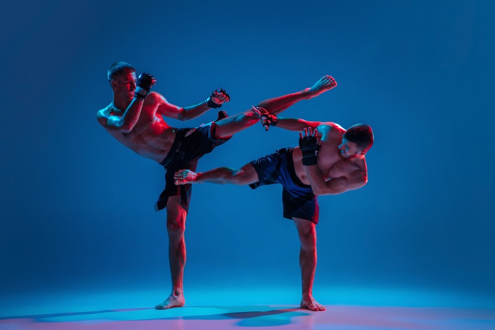 Two men practicing kickboxing.
Source: Freepik
