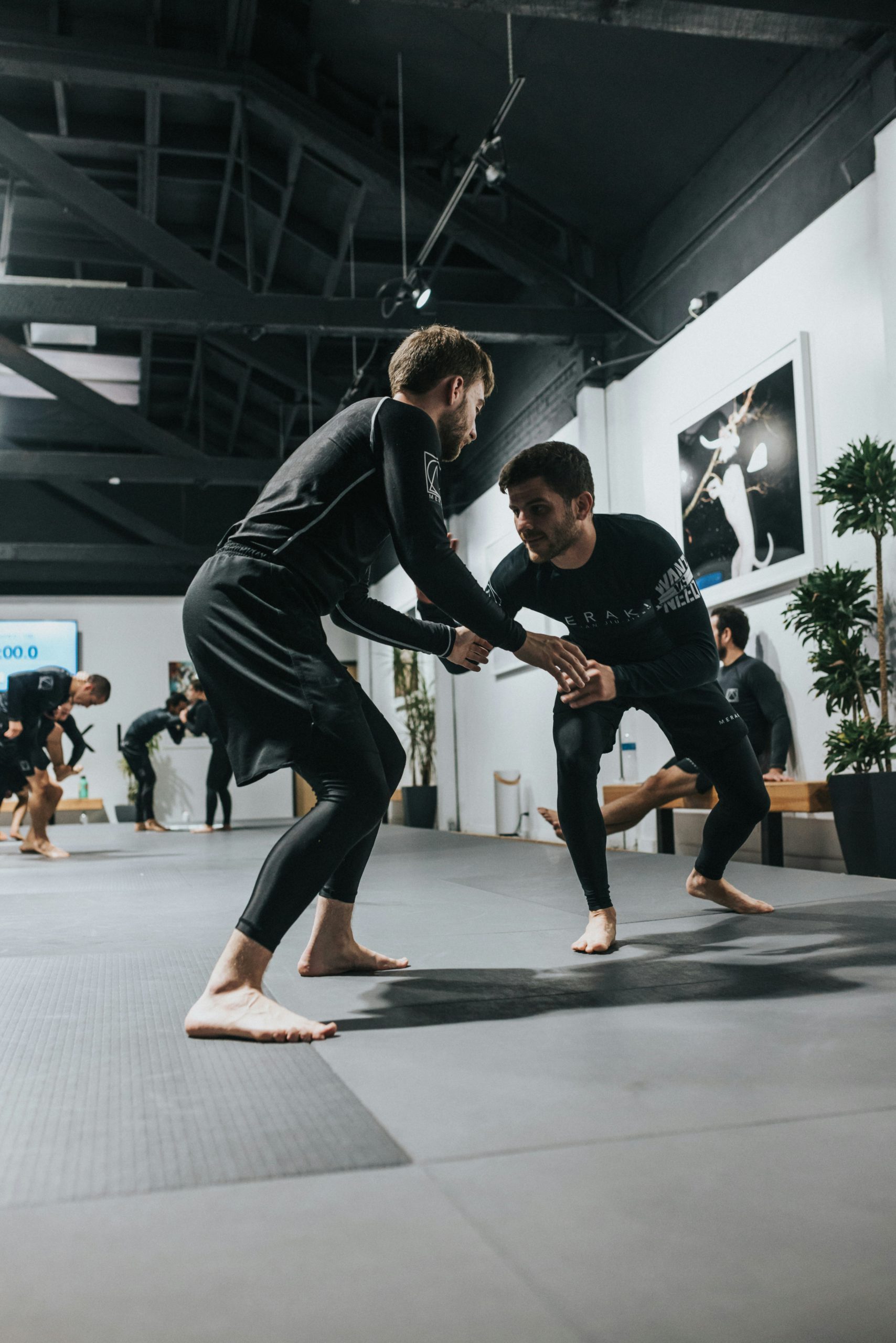 Two men practicing martial arts.