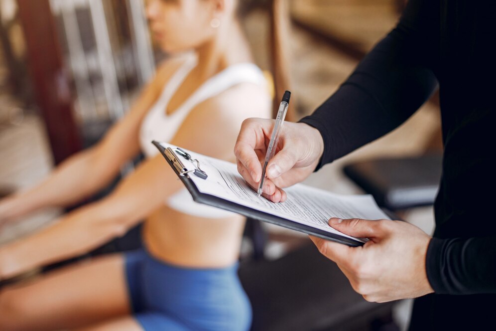 A plan of marketing strategies written in a gym, for the gym.