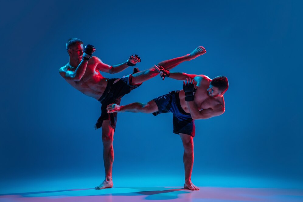 Two men practicing kickboxing. Source: Freepik