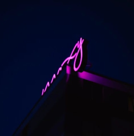 A neon sign with a gym’s name, the location is worth remembering.