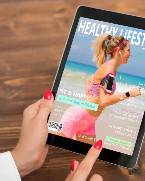 A woman reading a magazine with fitness ads on her tablet.