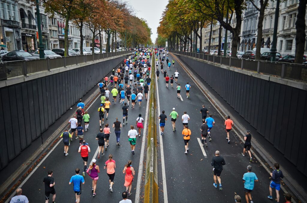 A charity event: a marathon through the city streets organized in cooperation with local authorities is another gym event idea.