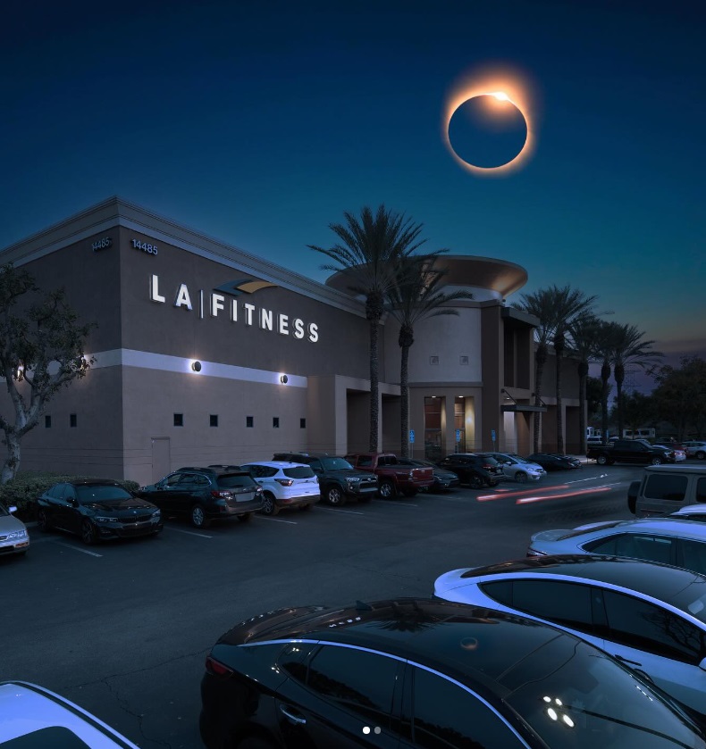 Solar eclipse over LA Fitness building.