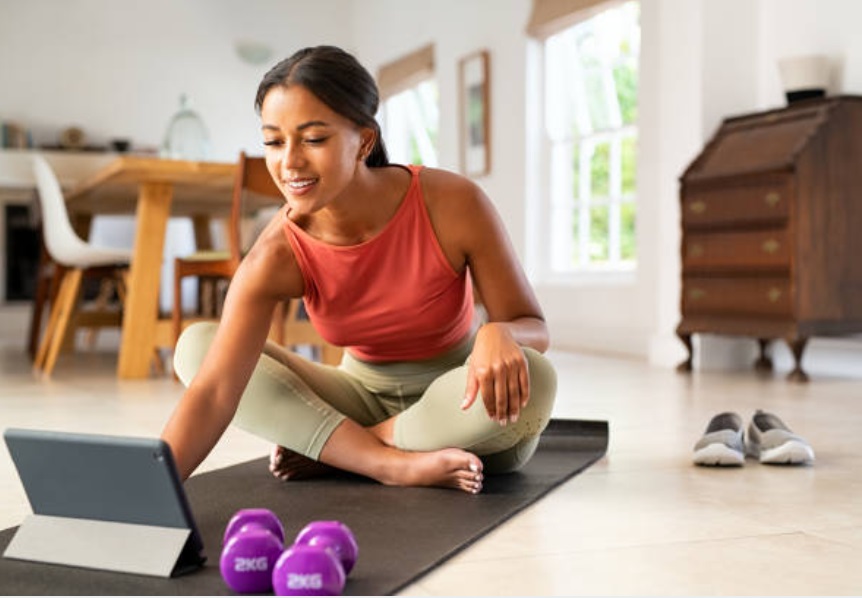 A woman ready for a virtual personal training.