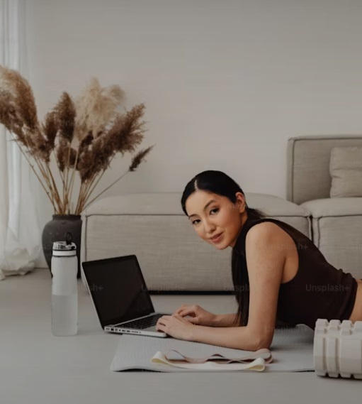 A woman ready for a meeting with her online personal trainer.