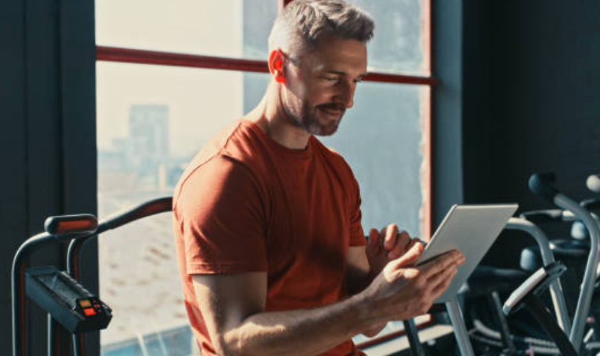 A man working as a manager of a gym.