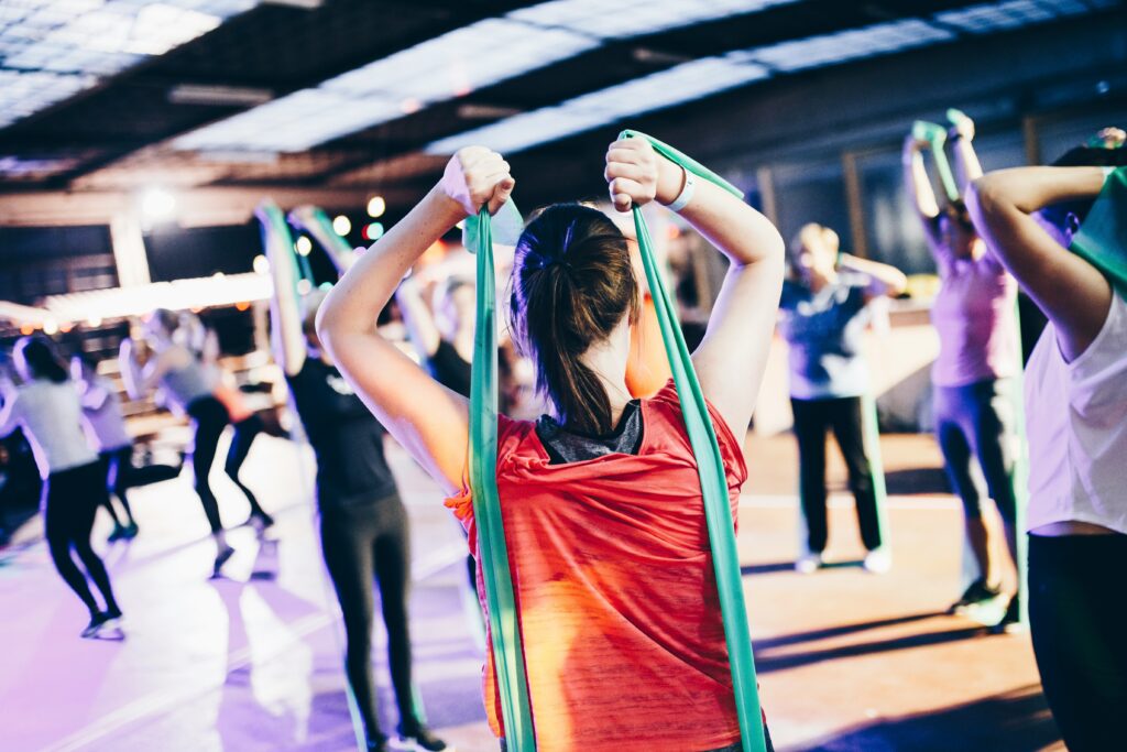 Special group fitness classes in public spaces are one of fitness challenge ideas to attract new gym members.