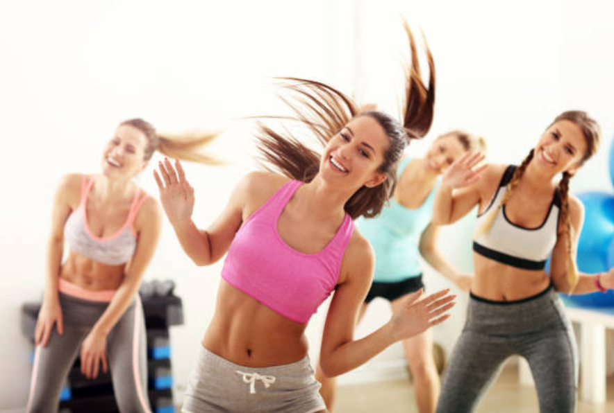 Group fitness themes may be connected with dancing.