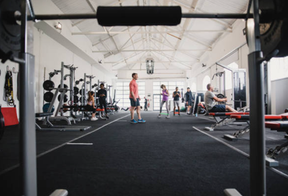 Commercial gyms are usually big and full of people and equipment.