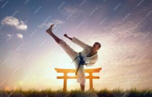 A man practicing japanese martial art with a typical architecture in the background.
Source: Freepik
