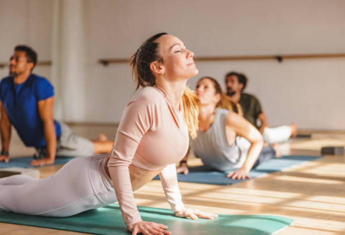 A fitness slogan for a yoga studio should emphasize flexibility and peace of mind.