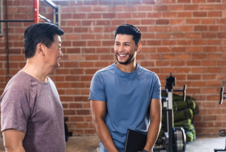 Talking about personal training services with a prospective client.
