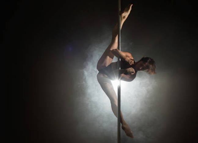 Performing live pole dance shows may be a lucrative ad-on to an average salary of a pole fitness instructor.