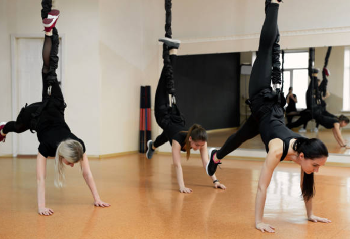 Bungee workout class. It is a low impact cardio exercise that may maintain muscle mass and help many muscle groups.