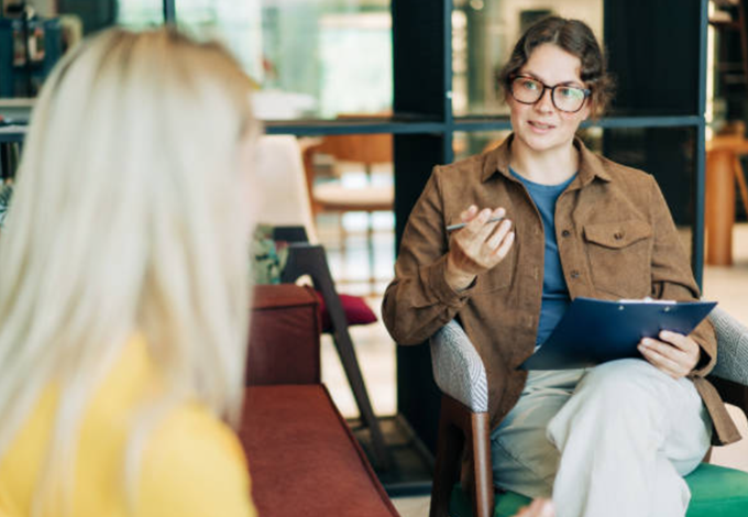A certified health coach is something else than a personal trainer: health coaches deal with stress management, help achieving health goals and support both mental health and physical health.