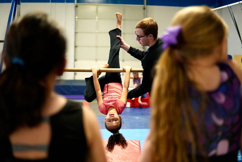 Trainers work with children in big centres or have their own gymnastics schools.