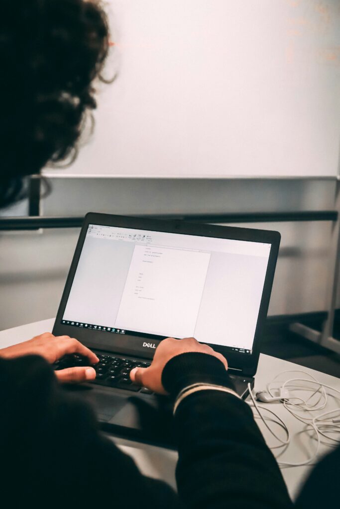 A spin classes business owner-to-be writing a BP for his cycling studio.