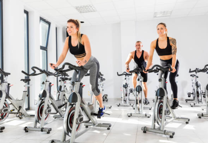 Spin classes in boutique spin studios (a small and intimate fitness space) have a unique atmosphere, no matter the fitness levels.