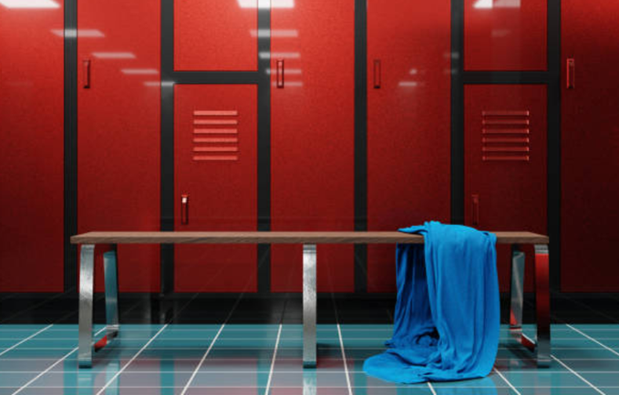 Gym locker room in a modern colorful fitness facility.