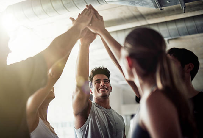 Fitness community: common fitness goals and a workout routine that brings new friends and supports well being.